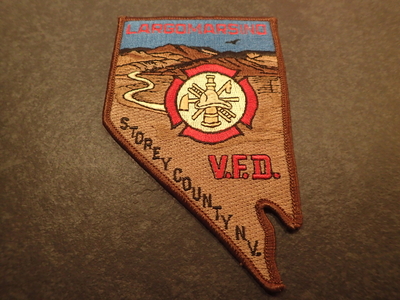 Largomarsino Volunteer Fire Department Storey County Patch (Nevada) (State Shape)
Thanks to Jeremiah Herderich for this picture.
Keywords: vol. dept. v.f.d. vfd
