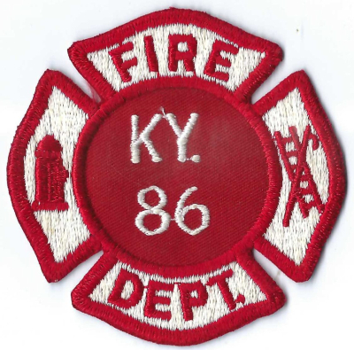 Kentucky 86 Fire Department (KY)
The Kentucky 86 Volunteer Fire Department, located in Cecilia, KY, was formed in 1979.  I love this patch because it shows the simplicity  back then of a newly created small FD in a small town.  Two colors and "KY 86" on a generic Maltese patch.
