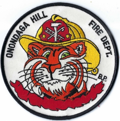 Onondaga Hill Fire Department (NY)
Desgined by Bill Patchet (BP), Syracuse FD.  Tony the Tiger was approved for this patch by Kellogg's Ceral in the 70's.
