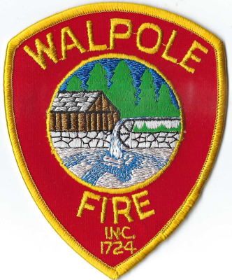 Walpole Fire Department (MA)
The Walpole Fire Department features a historic old building, often recognized as the town’s iconic Walpole Public Library positioned alongside a waterfall, representing the town's early industrial history and river geography. 
