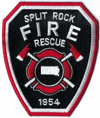 Split Rock Fire Rescue (SD)
One of the large rocks that protrudes from the ground on the east side of the lake is cleaved nearly in two, hence the name Split Rock.

